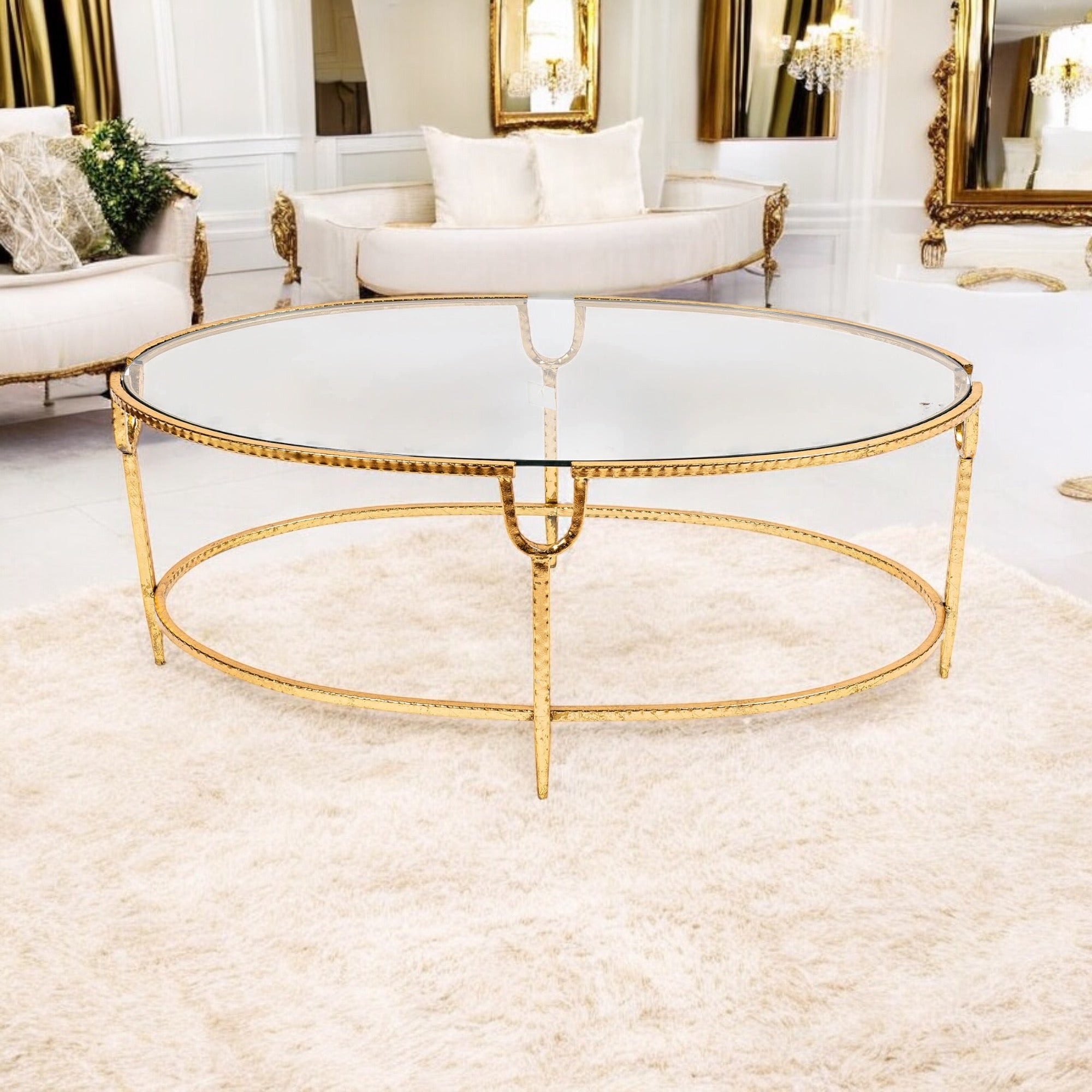 Gold guilt leaf oval coffee table.