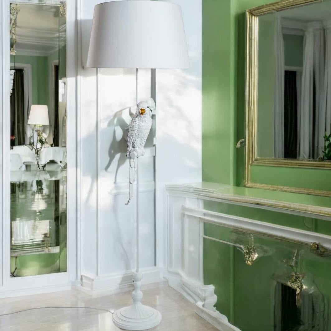 White parrot floor standing lamp.